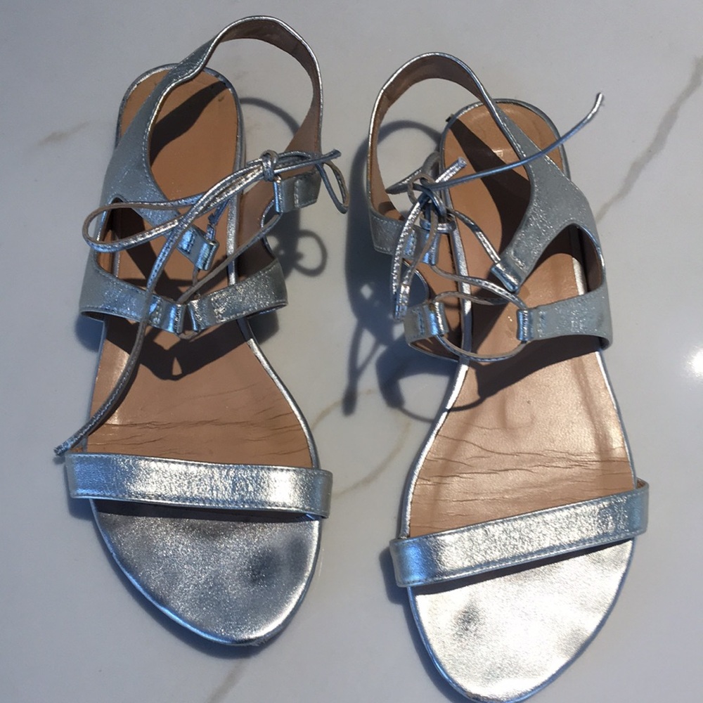Silver metallic sandal with lace up front